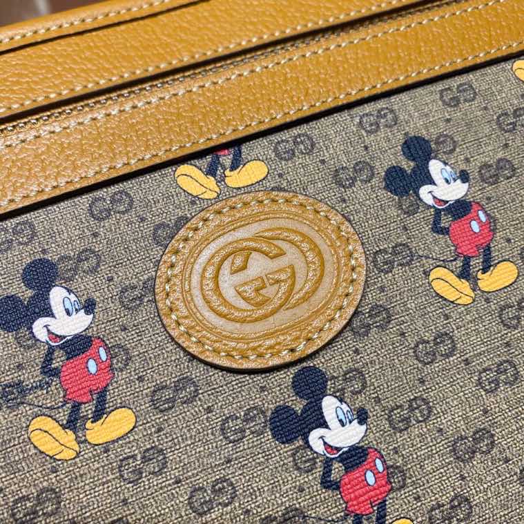 Disney x Gucci pouch 602552