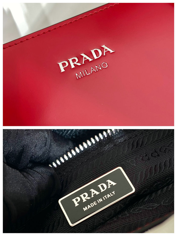 Prada Re-Edition 1995 brushed-leather medium handbag Red 1BA350