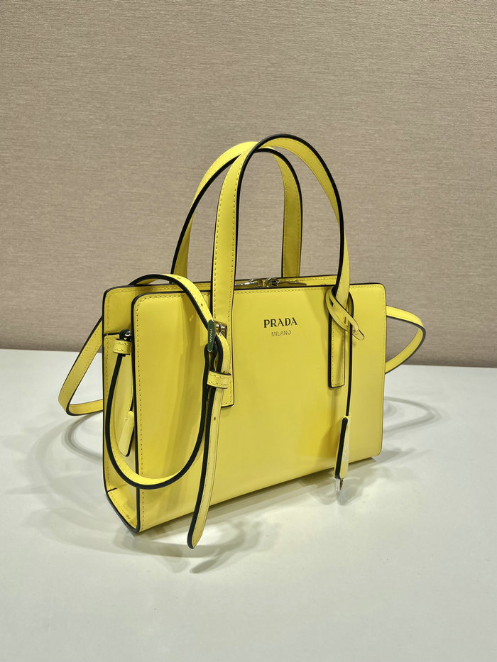 Prada Re-Edition 1995 brushed-leather mini handbag Yellow 1BA357