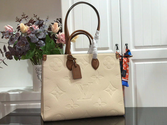 Louis Vuitton Monogram Empreinte Onthego Cream M44925