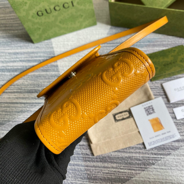 Gucci GG embossed mini bag Yellow 625571