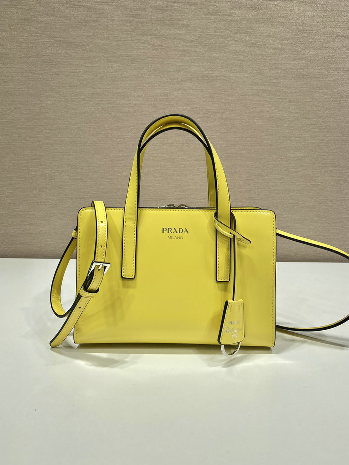 Prada Re-Edition 1995 brushed-leather mini handbag Yellow 1BA357