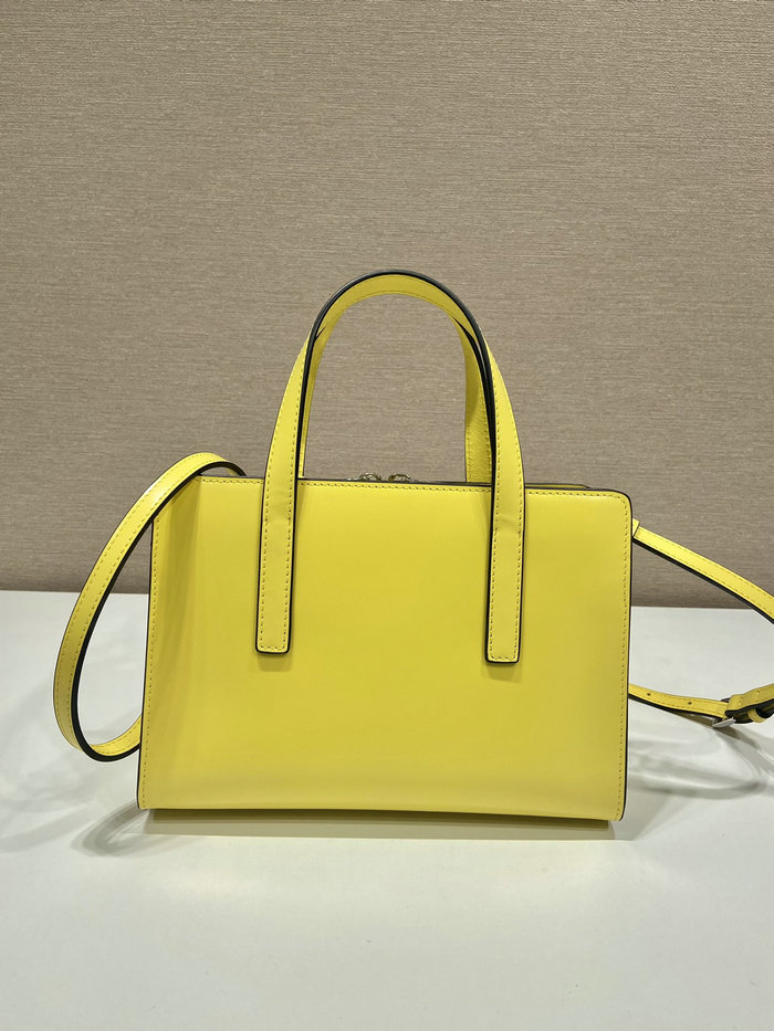 Prada Re-Edition 1995 brushed-leather mini handbag Yellow 1BA357