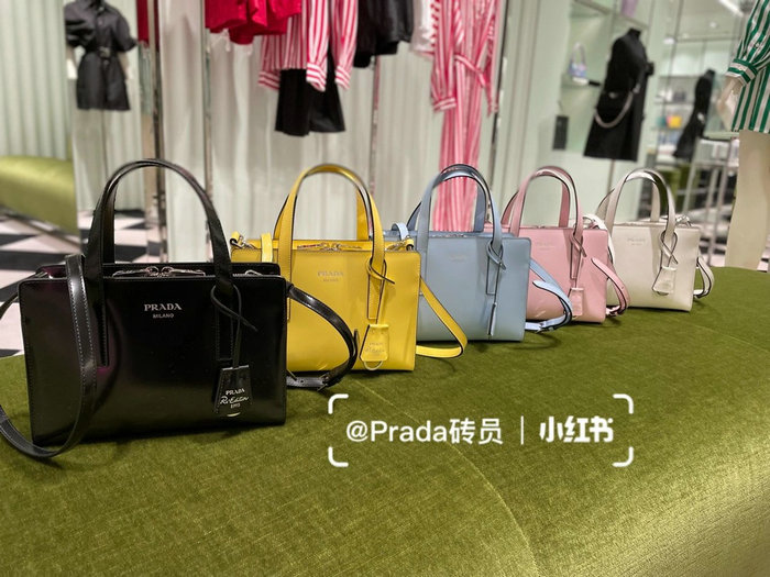 Prada Re-Edition 1995 brushed-leather mini handbag Yellow 1BA357