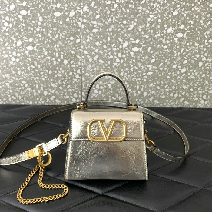 Valentino Garavani Micro VSling Handbag Gold V412