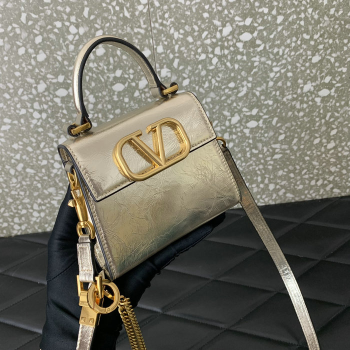 Valentino Garavani Micro VSling Handbag Gold V412