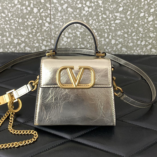 Valentino Garavani Micro VSling Handbag Gold V412