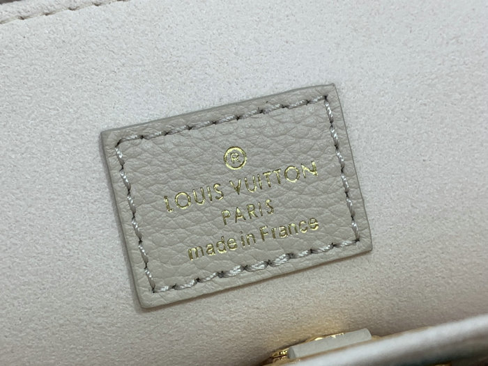 Louis Vuitton Lock & Go Cream M23637