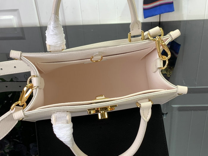 Louis Vuitton Lock & Go Cream M23637