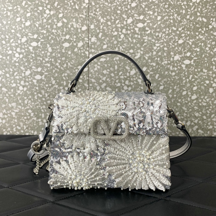 Valentino Garavani mini VSLING embellished tote bag V0062