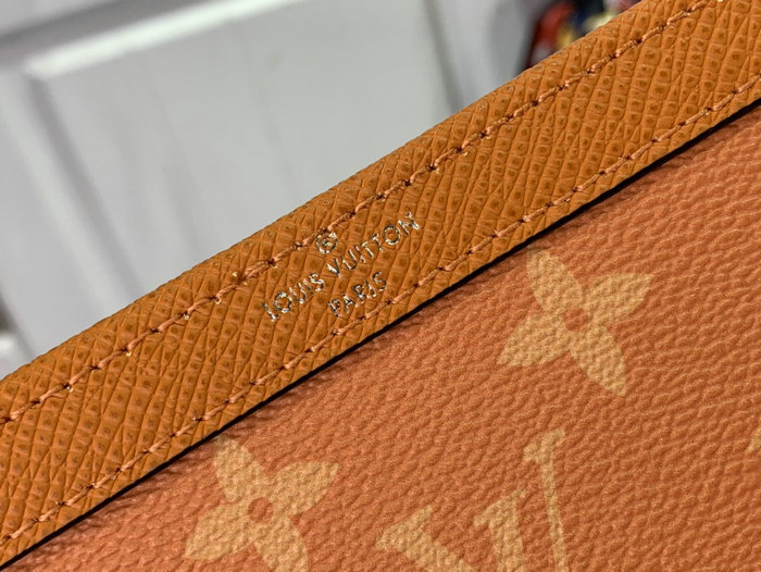Louis Vuitton Gaston Wearable Wallet Orange M83099