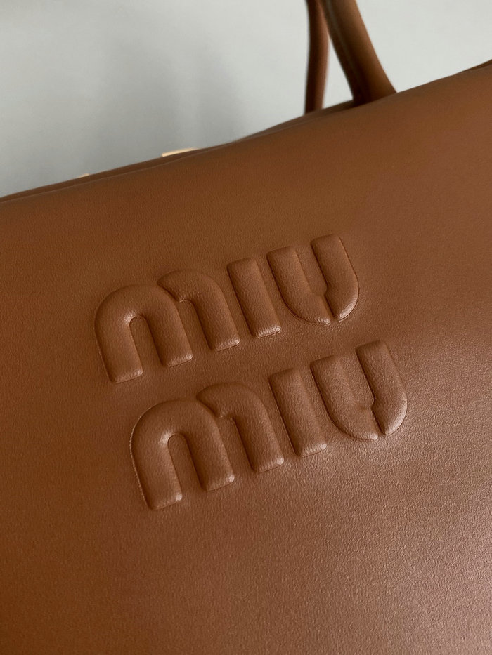 Miu Miu Leather top-handle bag Camel 5BB117