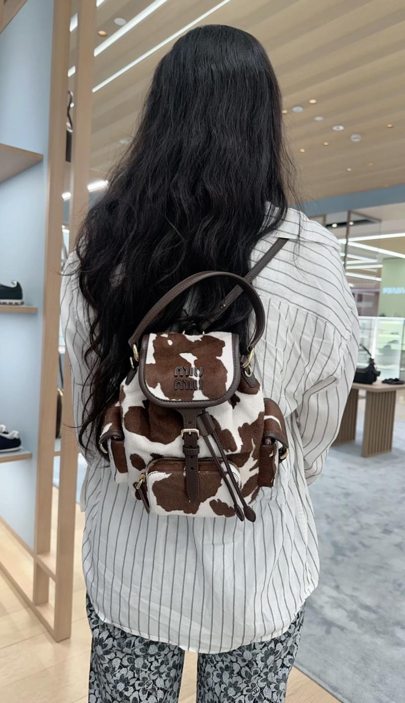Miu Miu Printed leather backpack 5BZ043
