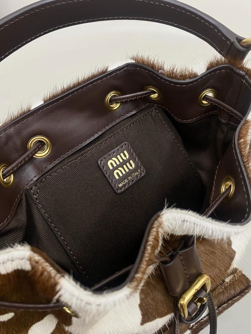 Miu Miu Printed leather backpack 5BZ043