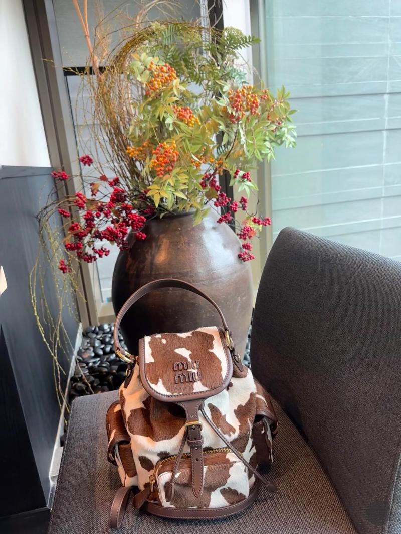 Miu Miu Printed leather backpack 5BZ043